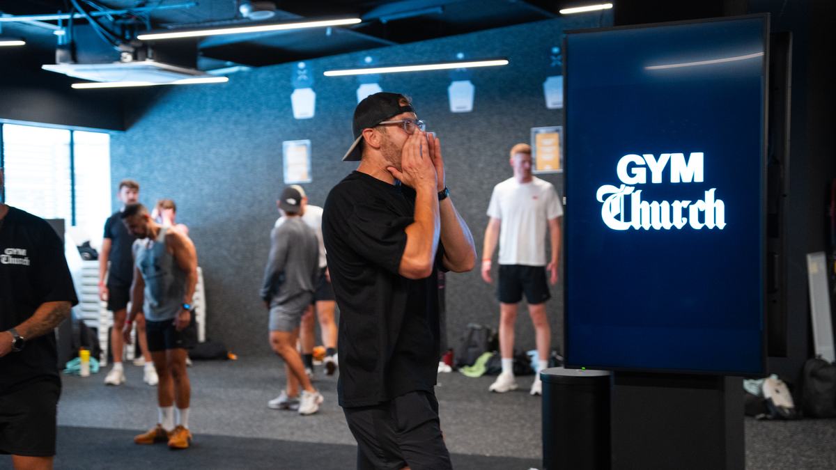 A Gym Church leader calling the room together in Melbourne
